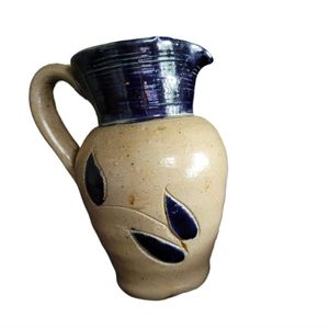 Vintage small hand made glazed pitcher